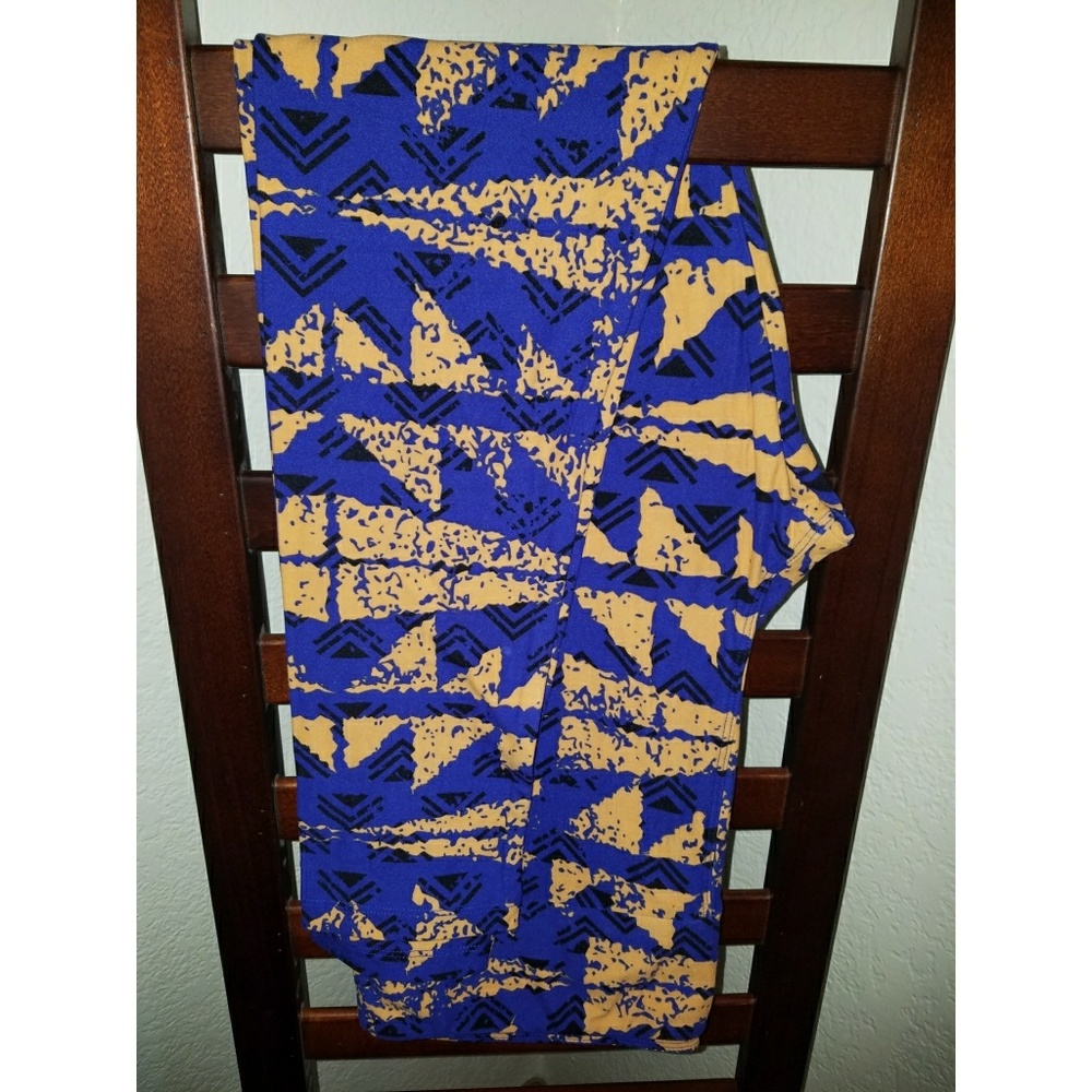 TC LuLaRoe Leggings, Purple w/ Peachy deisgns.