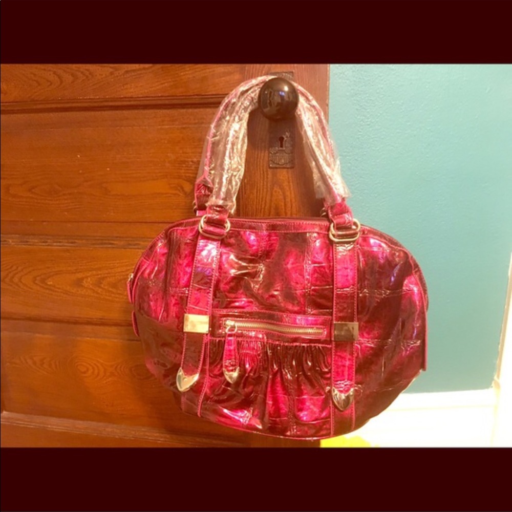 Used red/ pink metallic purse