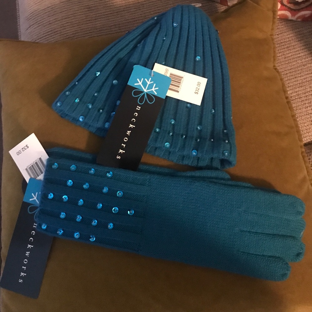 Turquoise winter hat with matching gloves.