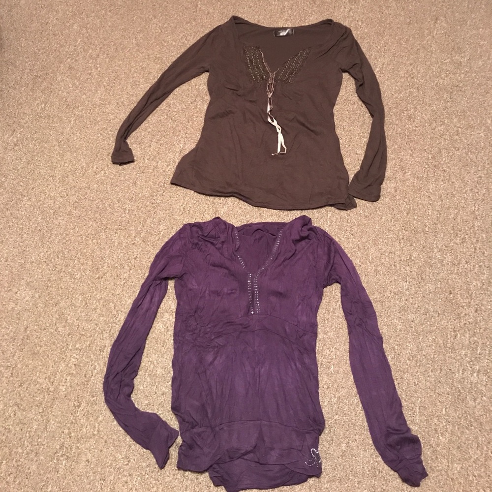 Two dressy long sleeve shirts. Practically new.