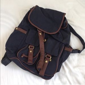 Blue and Brown Leather Backpack