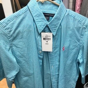 Two Ralph Lauren button down shirts.