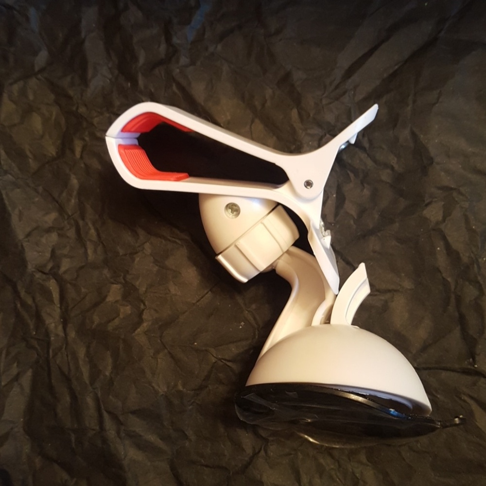 Rotate cell phone clip/stand