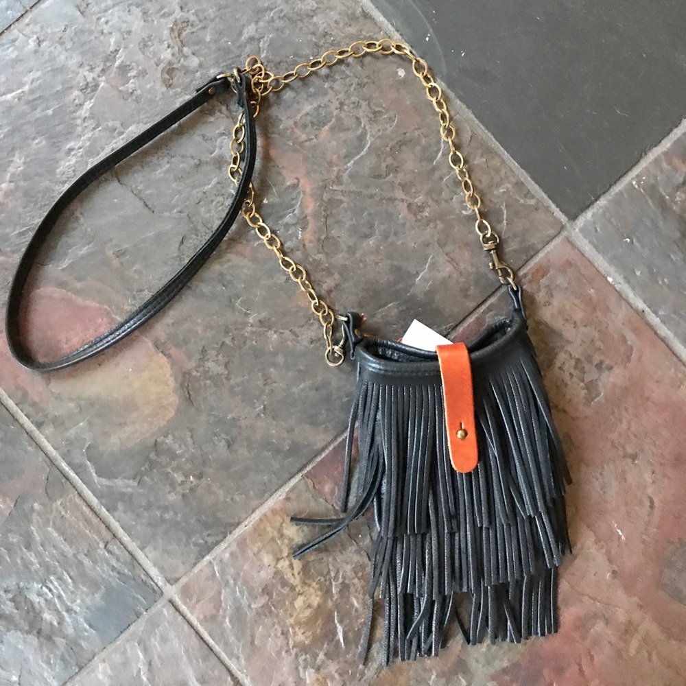 Canoe leather fringe crossbody bag