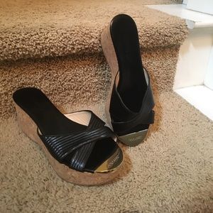 Jimmy Choo black and gold platform wedges