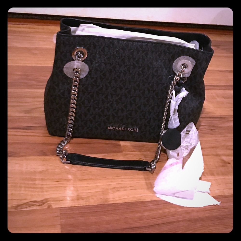 Michael Kors NWT small purse. Black with silver