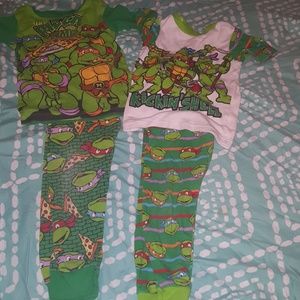 Two pairs of TMNT Pajamas.