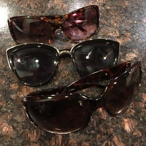 3 pairs of sun shades.