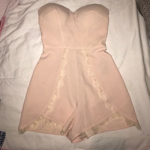 Bebe light pink strapless romper