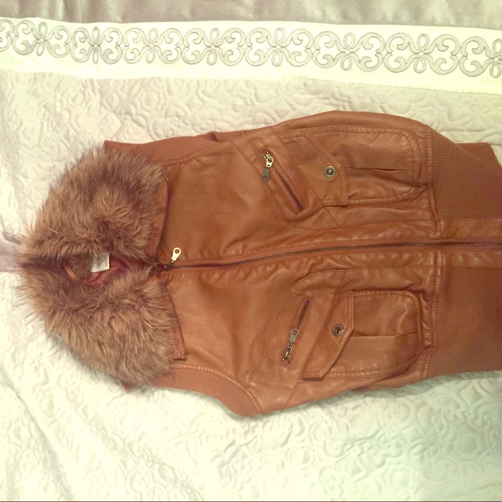 Trendy fur sleeveless jacket