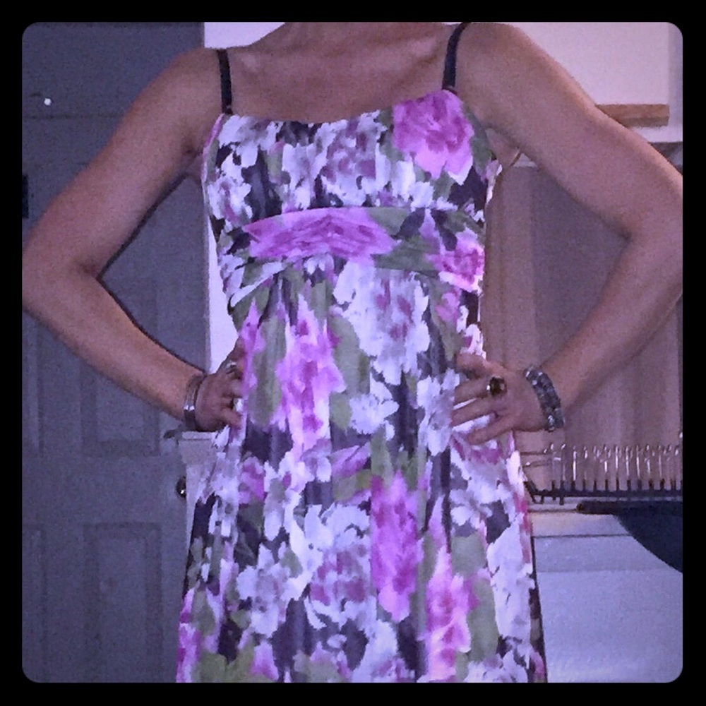 Empire waist floral dress with a tie back.