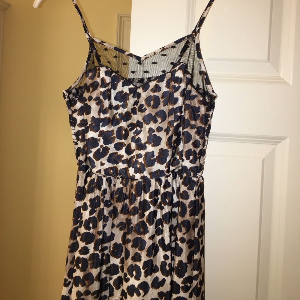 Leopard print dress with mesh at chest