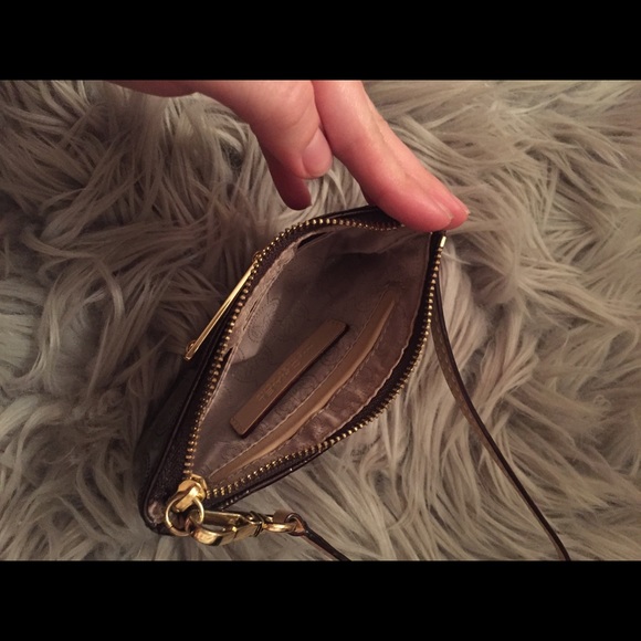 Authentic Michael kors dark plum colored wristlet - Picture 3 of 3