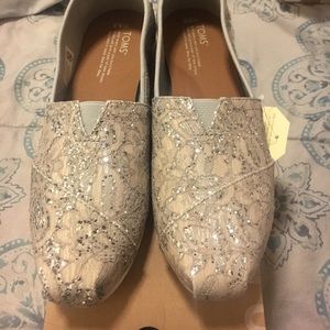 Brand new TOMS. Still in box.