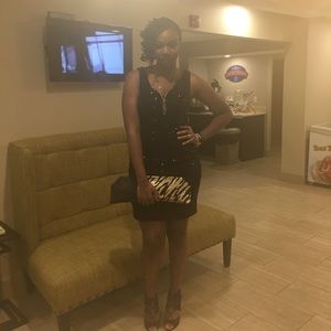 Sequined little black dress