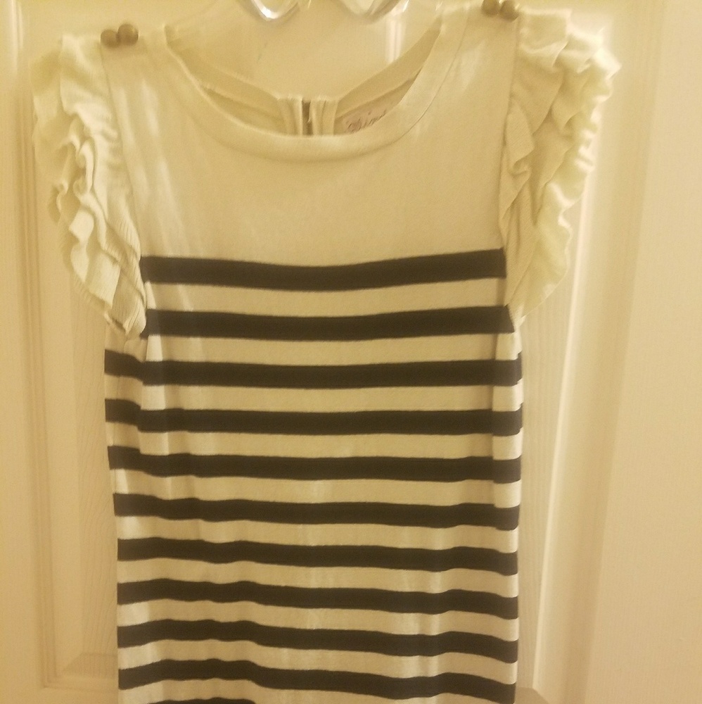 A Glimmer by J.J. Basics tightly dress.