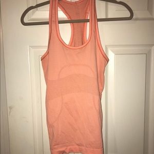 Orange lululemon racerback tank top