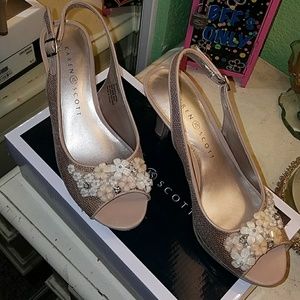 Nude Heels! With flower decor in the front