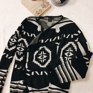 Black and white fringe wrap sweater