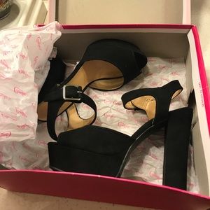 Black heels worn once still look new.