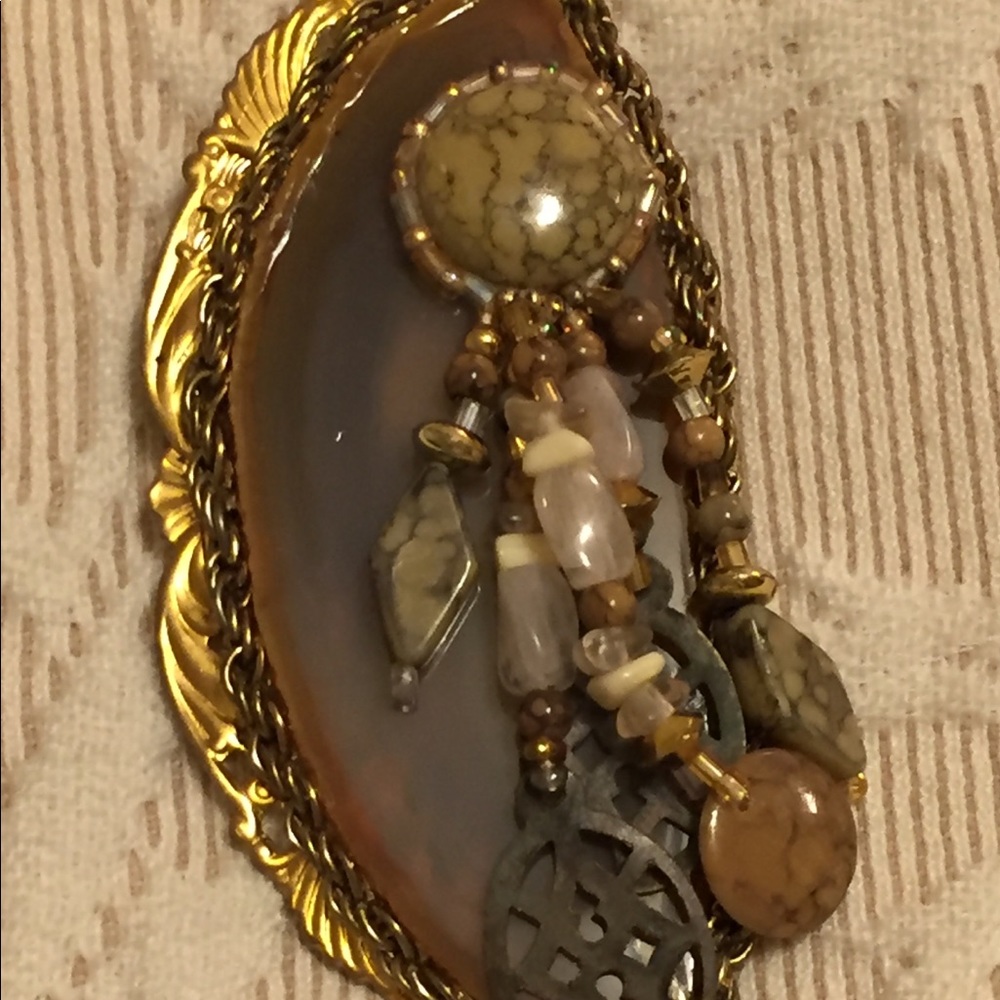 Very classy brown stone pin