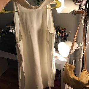 Long sleeveless dressy shirt with slip sides