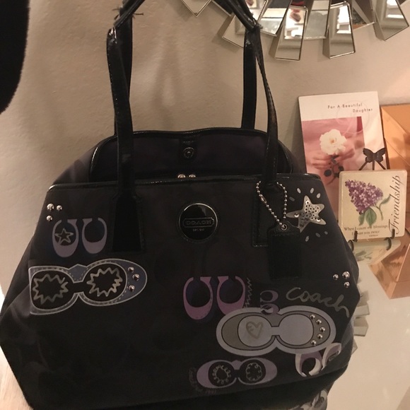 black and purple coach purse
