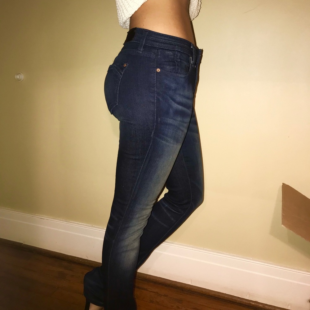 Buckle dark wash skinny jeans