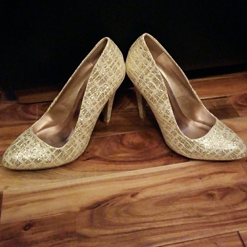 Never been used gold glitter heels