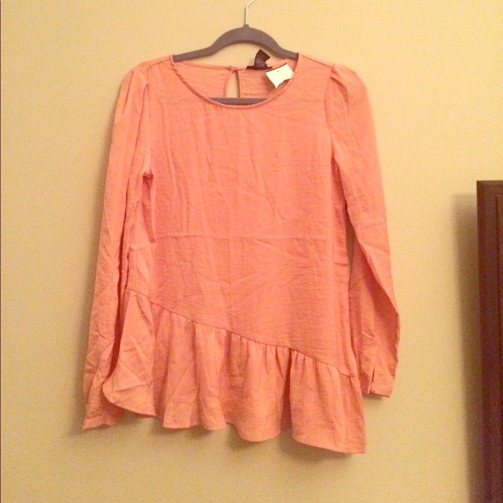 Pink long sleeved blouse