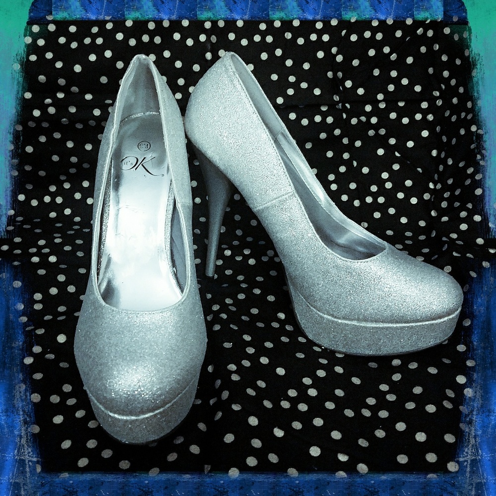 It's OK silver heels Sz 9