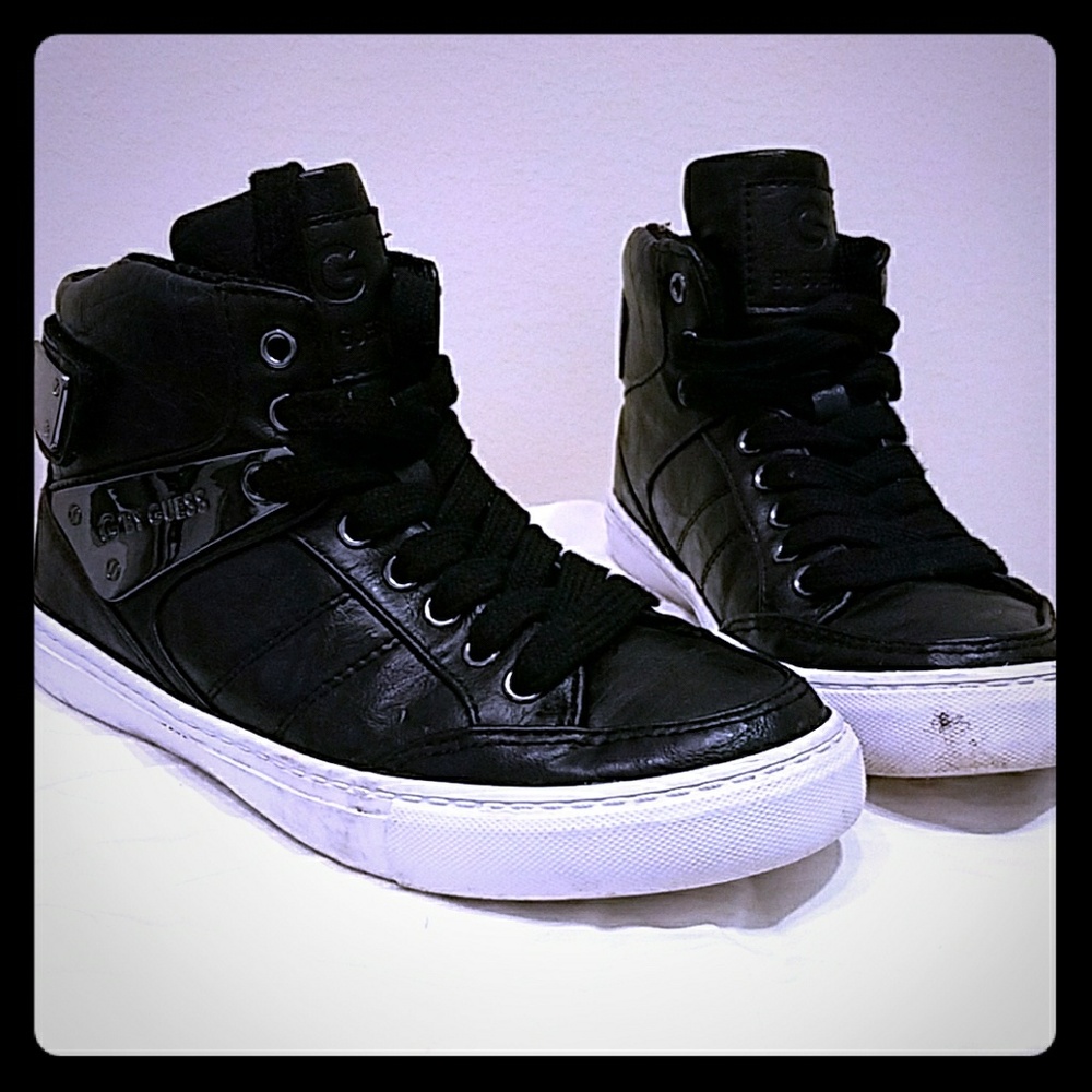 Black hightop shoes. G by Guess.