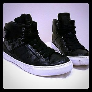 Black hightop shoes. G by Guess.