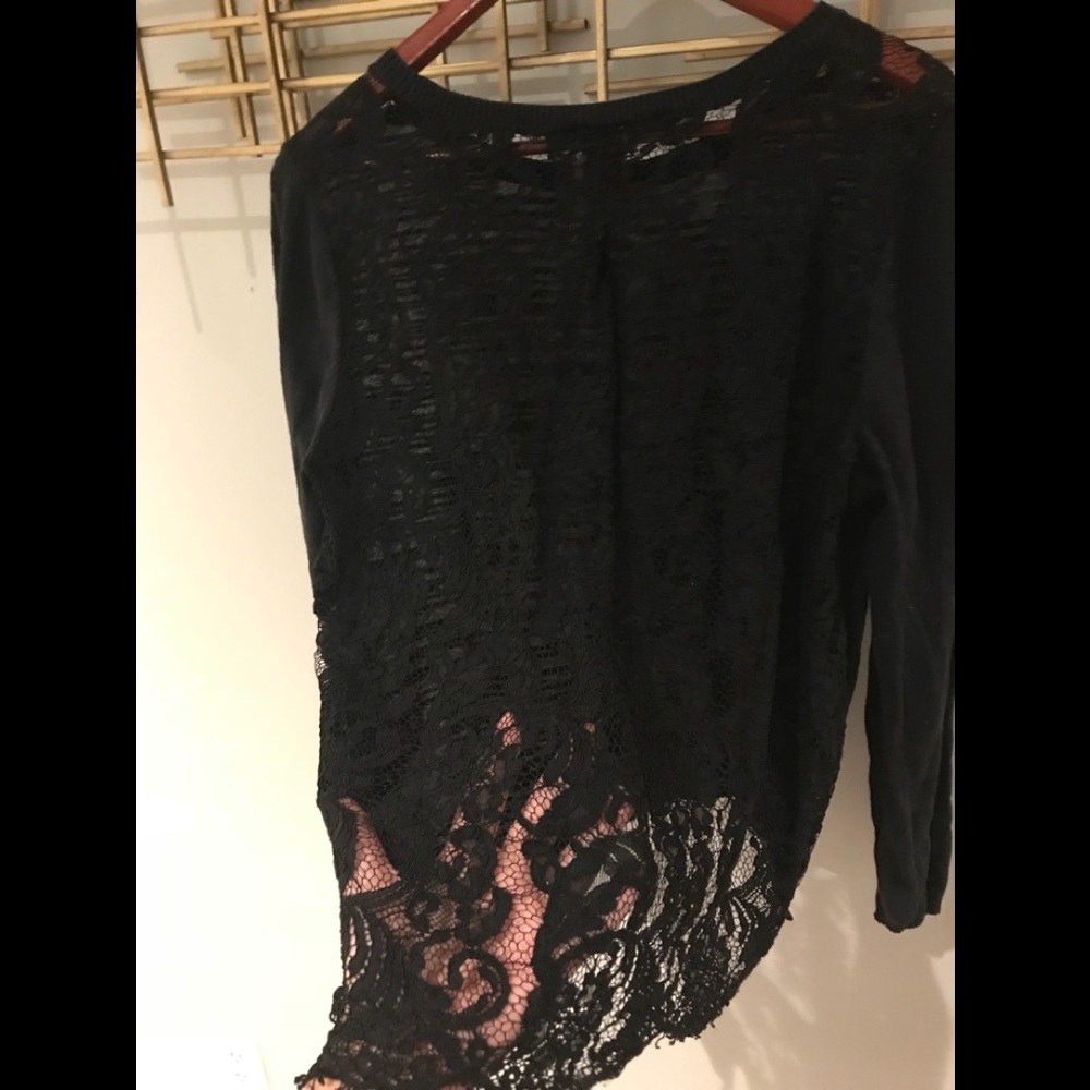 Black Cabi sweater with a lace back