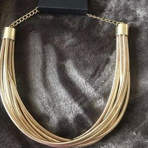 Brand new with tags Bebe gold fancy necklace