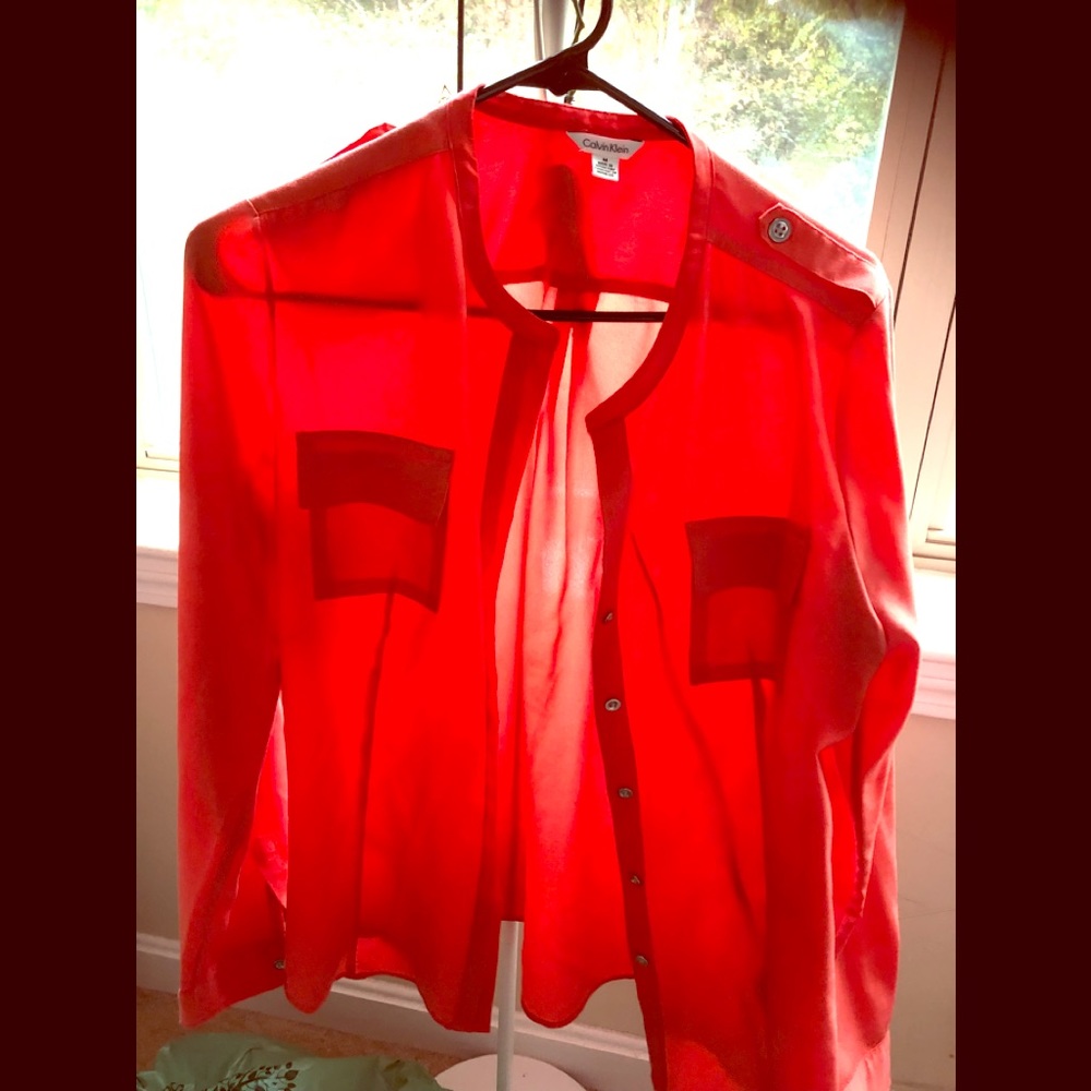 Ladies red/orange blouse by Calvin Klein size M.
