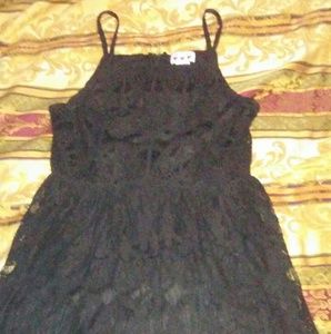 Black laced mini dress.