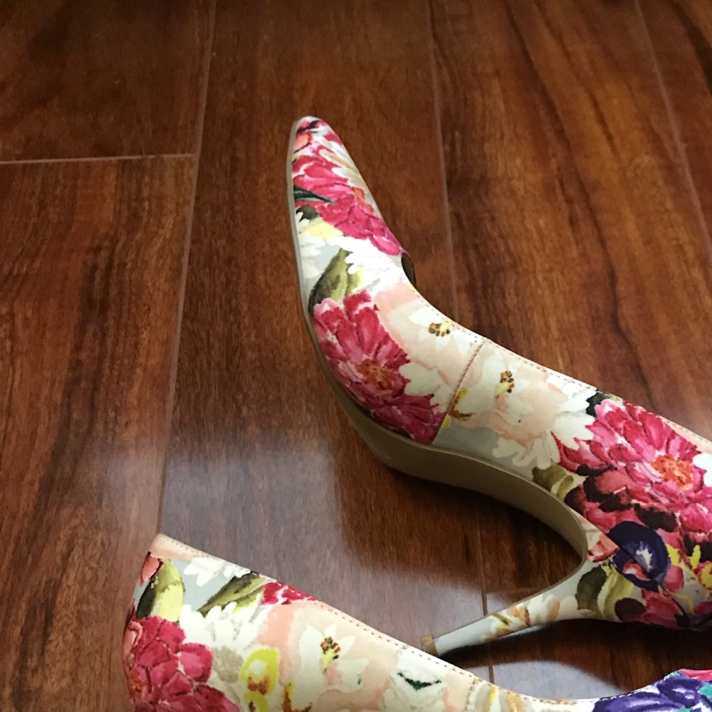 Pair of white-and-pink floral pointed-toe shoes