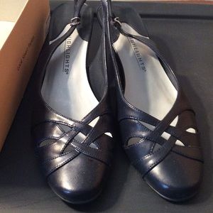 Brand new, never worn navy sling backs