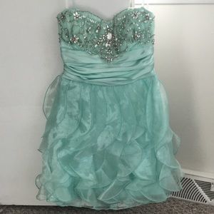 Mint green dress.