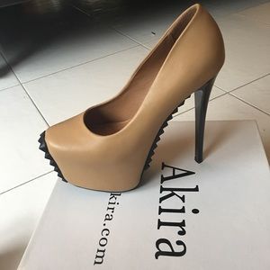 Taupe and black stilettos.