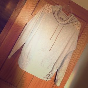 Oatmeal colored lace accented top