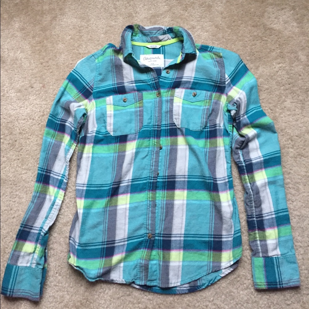 Women’s long sleeve button up.