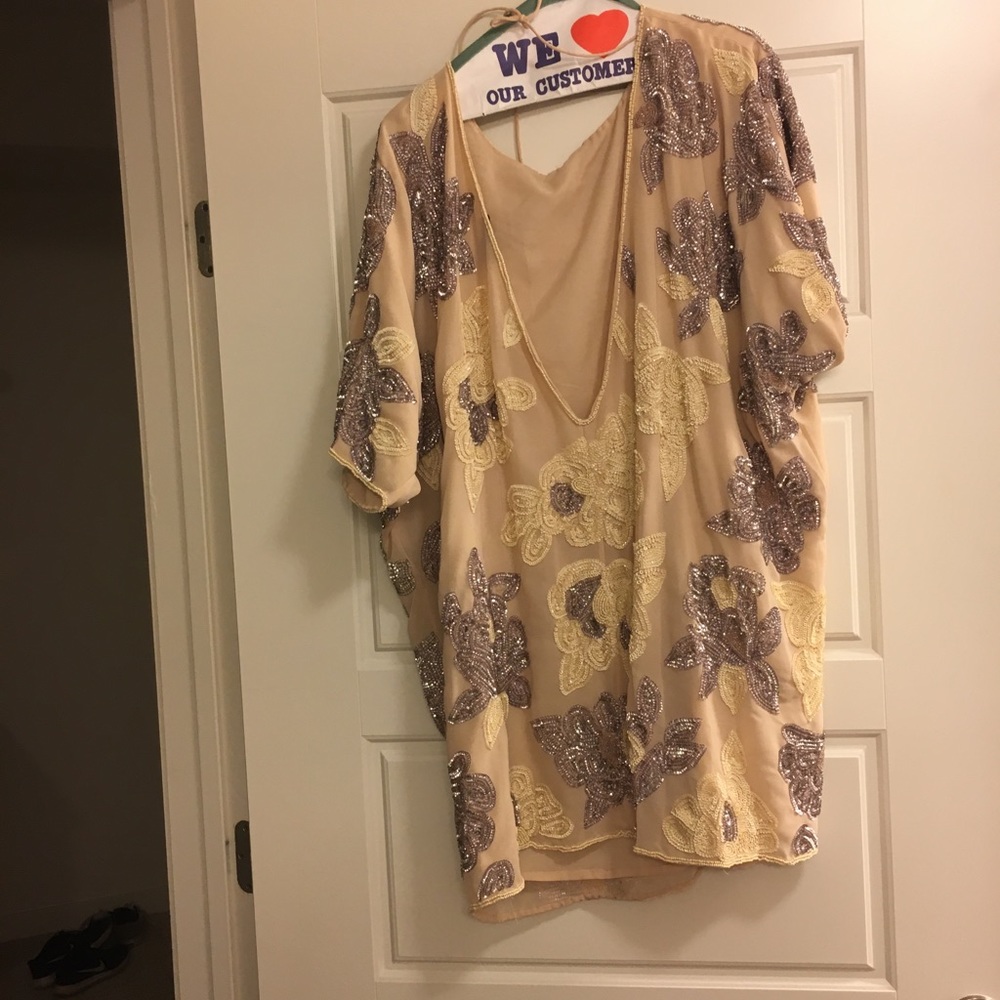 Sequin mini dress with low back