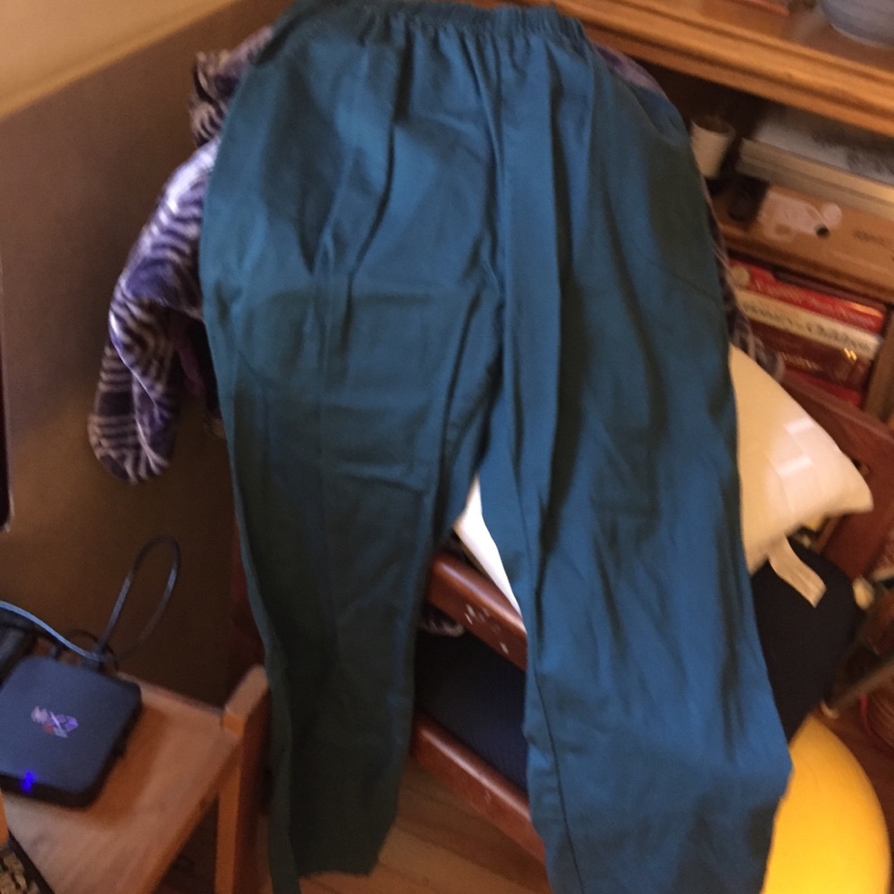 Deep aqua colored,stretch waist, side pockets