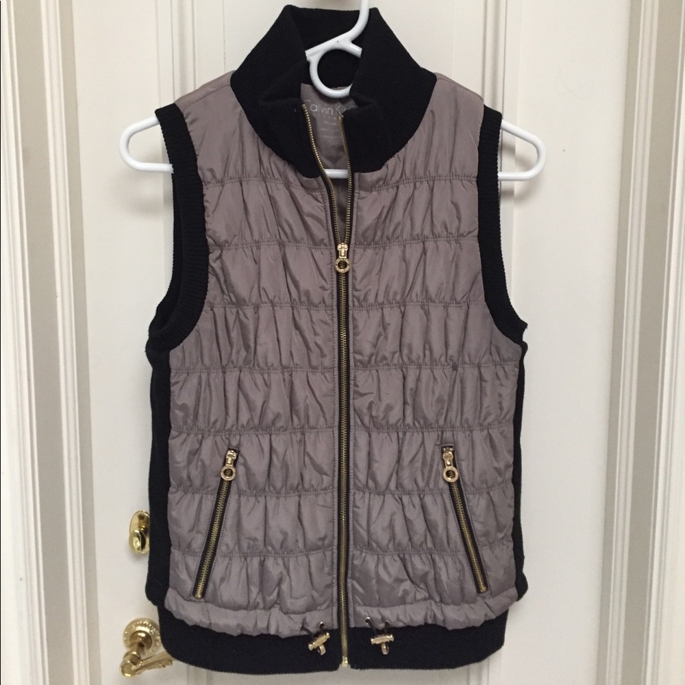 Calvin Klein quilted vest in grey, black, and gold