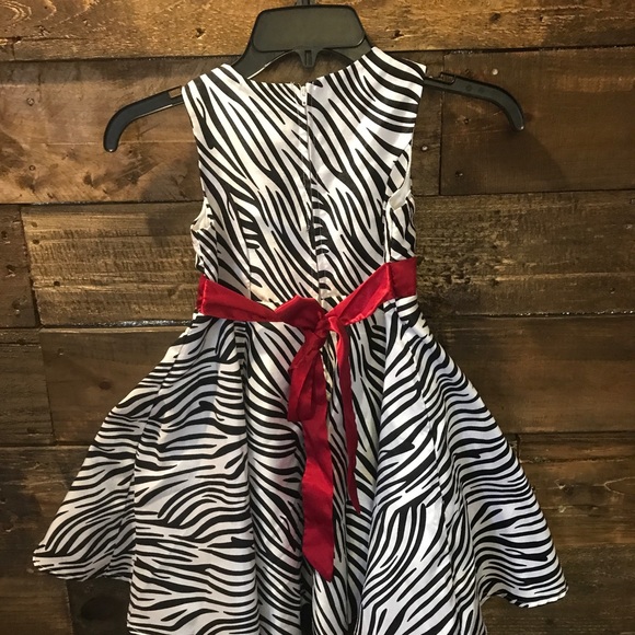 Rare Edition Zebra patterned dress with red bow - Picture 7 of 8