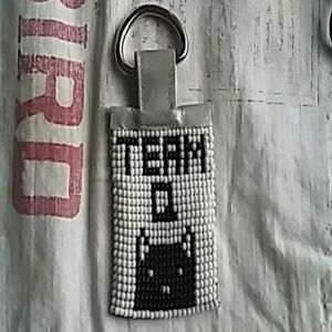 Impractical joker team q keychain