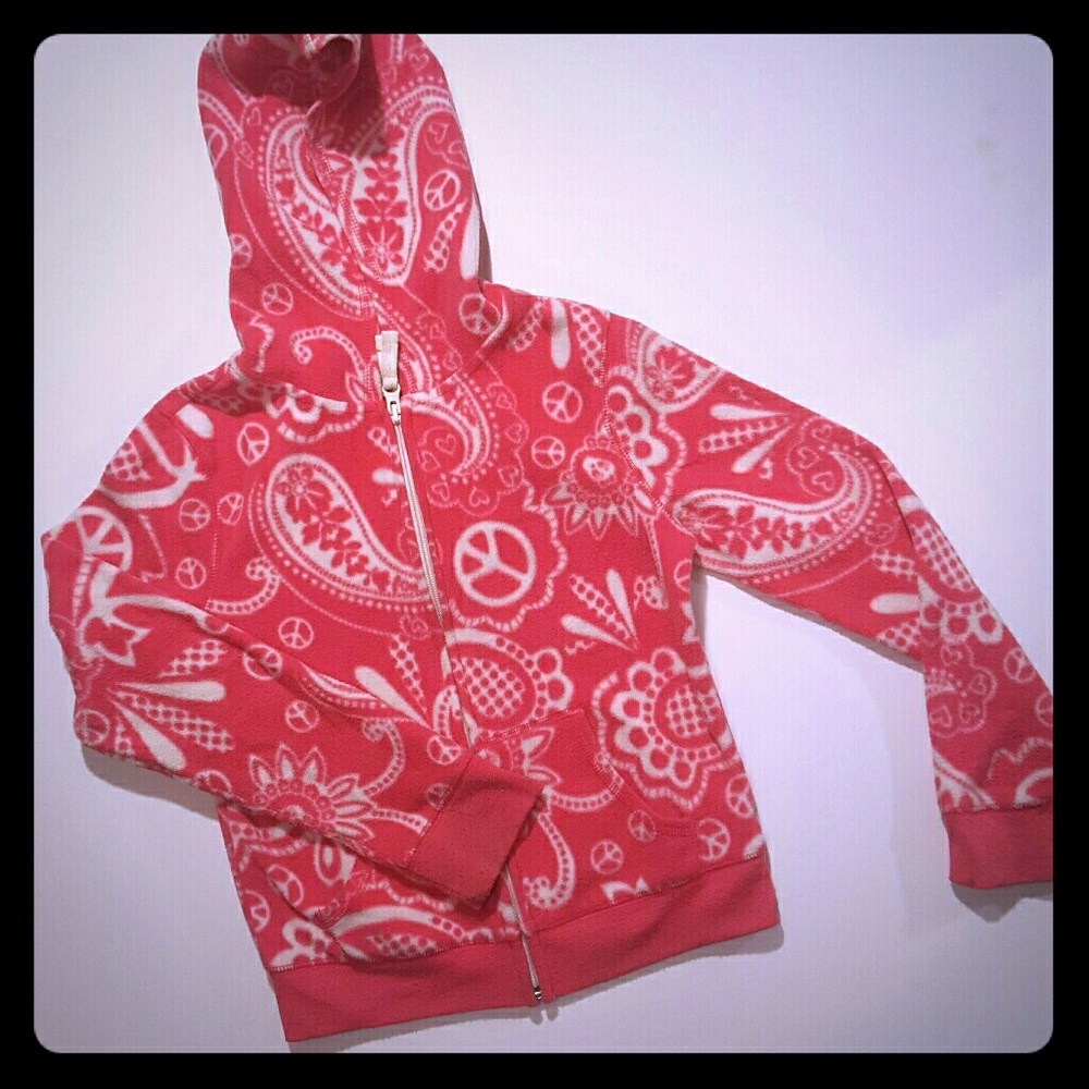 Pink and white fleece hoodie.
