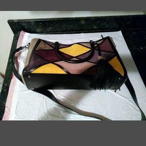 Brand New Geometric Multi colored Tan Brief Bag